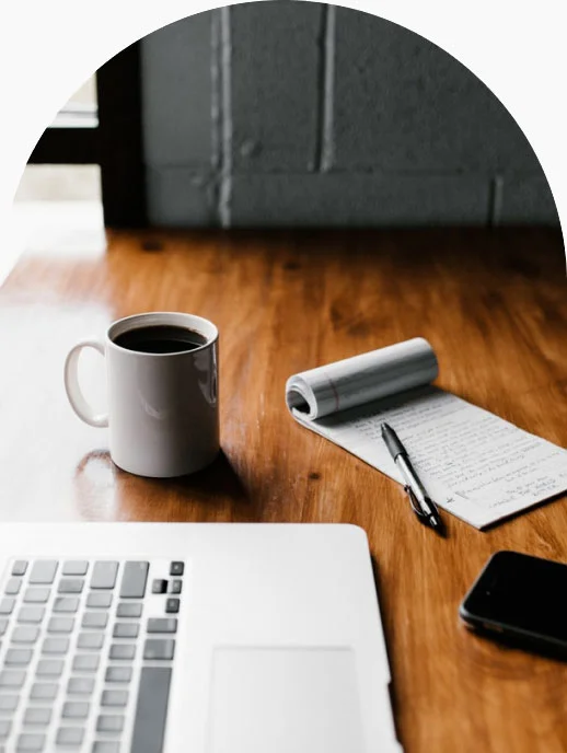 laptop notebook and cup